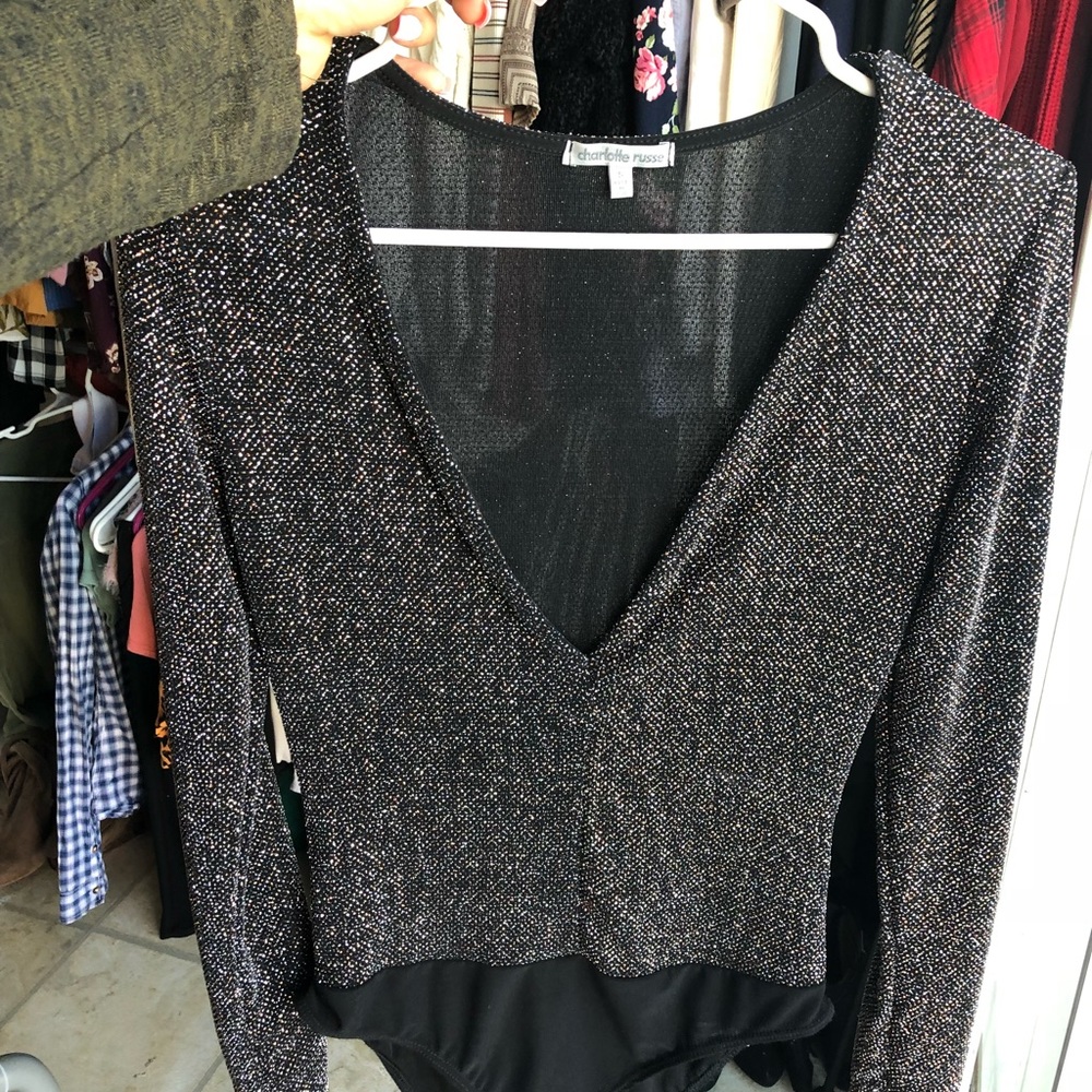Low V neck body suite , with cute shimmer patter .